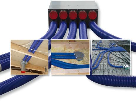 Vallox BlueSky -ilmanvaihtojärjestelmän osia: ilmanjakolaatikko, venttiiliyhde ja ilmanvaihtokanavat.