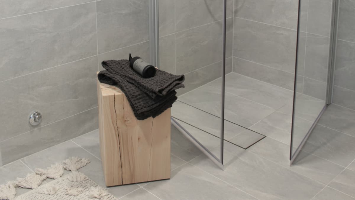 Linjalattiakaivo antaa vapautta toteutukseen - märkätilojen remontointi taloyhtiössä