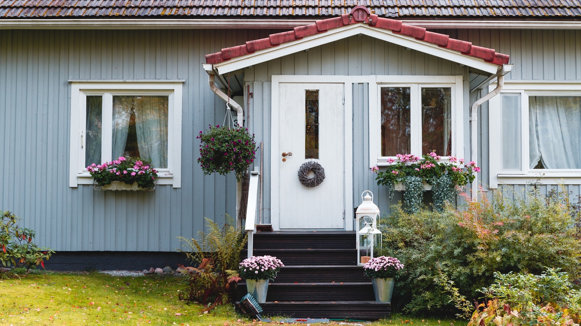 fragment-of-wooden-finnish-blue-house-with-decorat-2024-10-17-20-37-32-utc